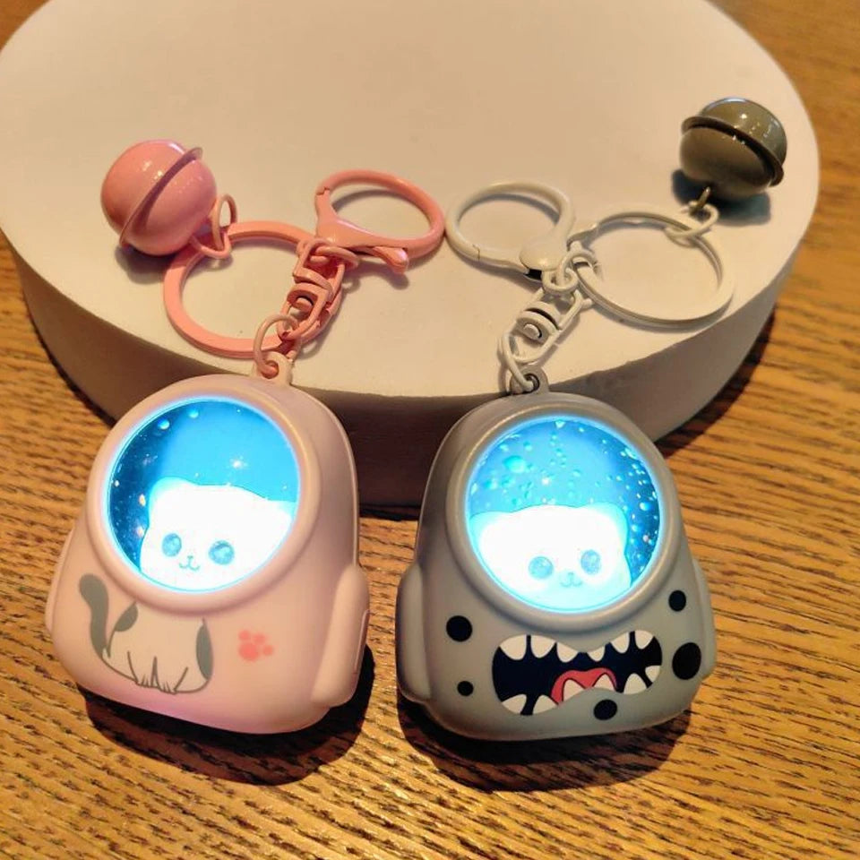 Llavero Kawaii Gatito Espacial — Astronauta con Luz · gachapon coleccionable